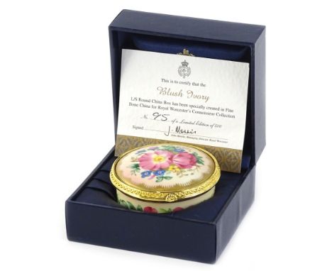 A Royal Worcester limited edition blush ivory box and cover, decorated with flowers, in fitted case with certificate, 6.5cm d