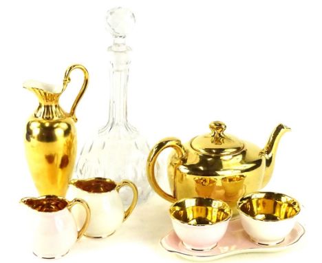 A collection of Crown Devon and gold lustre ceramics, to include jugs and a ewer, a similar Royal Worcester teapot, and a dec