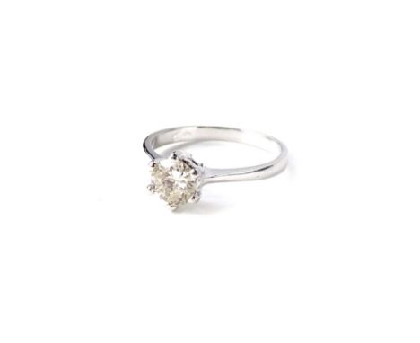 A diamond solitaire ring, set with round brilliant cut diamond, approx 1ct, in white six claw Tiffany style setting, in polis