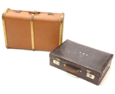 A blue leather dressing case, initialled HMD and a canvas and wooden trunk. (2)