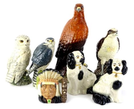 A collection of Beswick and Royal Doulton etc., to include a golden eagle decanter, an osprey flask modelled by D Lyttleton f