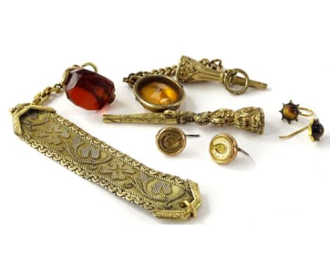 Various trinkets, comprising a citrine fob, in gold frame, on a etched drop design panel, a pair of gold horseshoe earrings, 