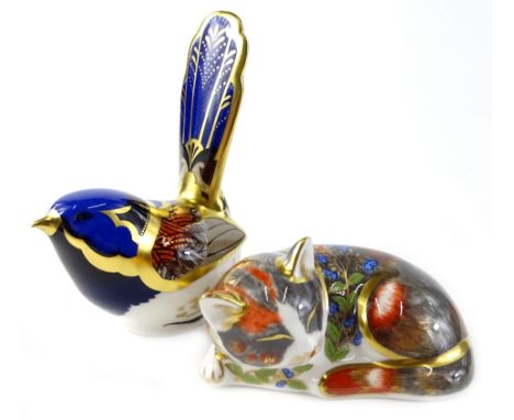 A Royal Crown Derby porcelain paperweight, modelled in the form of a wren, printed mark in red to underside and gold button a