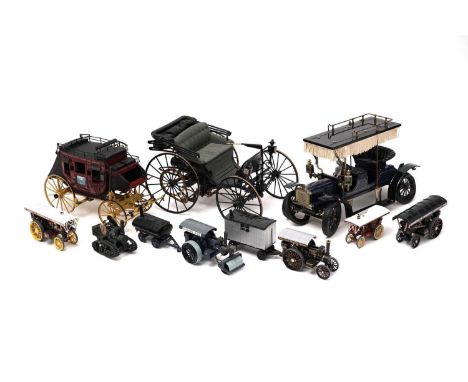 Four various Corgi Fowler B6 locomotives; a Corgi Garrett engine; a Wells Fargo Stagecoach by the Franklin Mint; and other di
