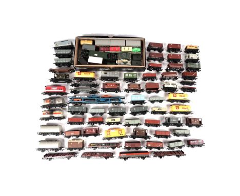 A selection of unboxed 00-gauge model railway rolling stock, makers include Hornby, Airfix and others. (Qty)