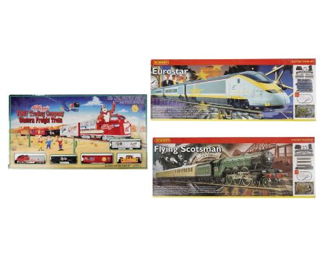 Two Hornby 00-gauge electric train sets, both boxed, comprising: R1019 Flying Scotsman; and R1013 Eurostar; together with a K