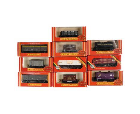 A selection of Hornby 00-gauge rolling stock, all boxed, including: R.671 6 Wheel Van Insulated Milk; R.670 6 Wheel Van Palet