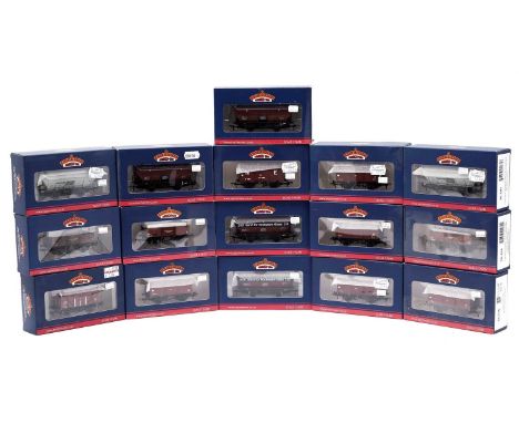 Bachmann 00-gauge rolling stock, including vans, wagons and other items, boxed. (16)
