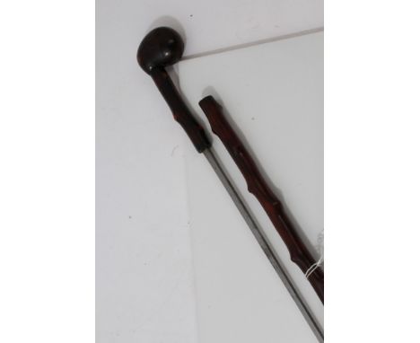 Victorian sword stick with tapered blade and briar sheath and knop handle, the blade 66cm