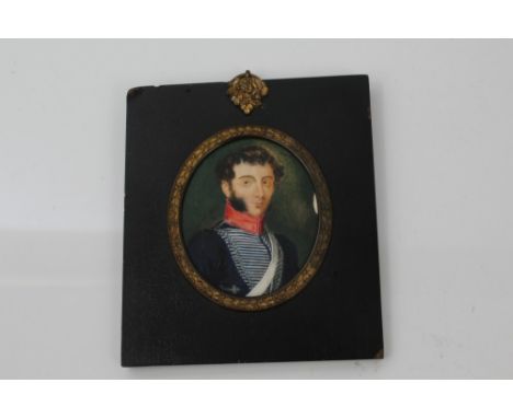 Early 19th century miniature on ivory - portrait of a Cavalry Officer in blue tunic with high red collar and silver French kn