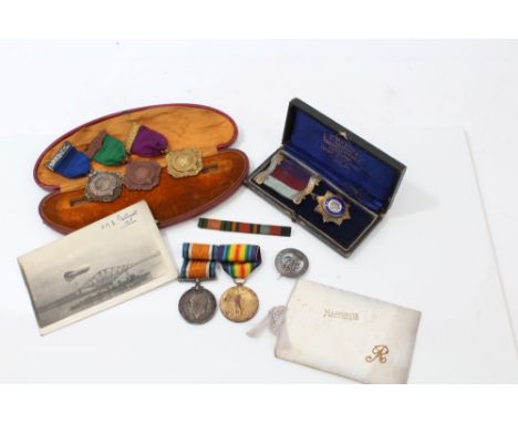 First World War pair - comprising War and Victory medals, named to 154110 PTE. F. A. Rainley. M.G.C., a silver wound badge nu