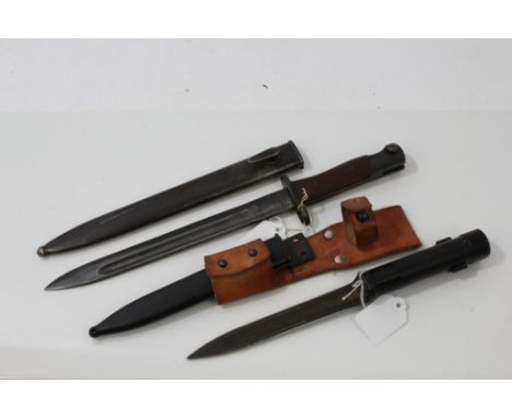 Siamese Mauser bayonet with scabbard and F N tubular spike bayonet with black plastic scabbard and brown leather frog (2) 