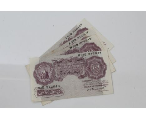 Banknotes - G.B. October 1940 K. O. Peppiatt mauve Ten Shilling notes.  Prefixes - U93D, W63D, X33D and Y85D.  All about VF -