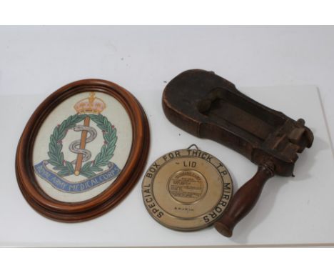Royal Army Medical Corps embroidered panel in oval frame, oak gas rattle and a case containing optical mirrors (3)