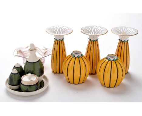Behscherzer: a five-piece garniture, comprising: three elongated vases with pierced rims, and two squat vases, all have black