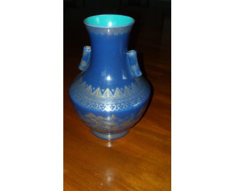 A 20th century powder blue ground arrow vase, the interior of the waisted neck turquoise, the shoulders with gilt lappet band