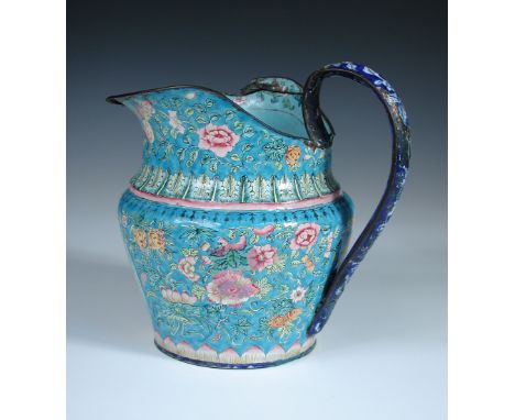 A late 18th/early 19th century Pekin enamel jug, the fisherman oval below the lip below a leaf band on the shoulders and on a