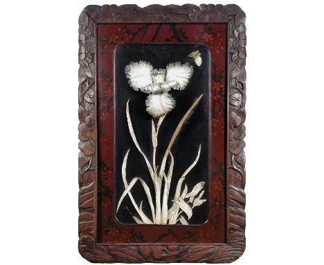 Two pairs of early 20th century inlaid black lacquer panels, each with bone and horn flowers, one pair in floral carved frame