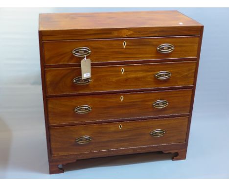 A Georgian mahogany chest of four graduating drawers with bone inlay and raised on carved bracket feet,H:98cm W:97cm D:45cm