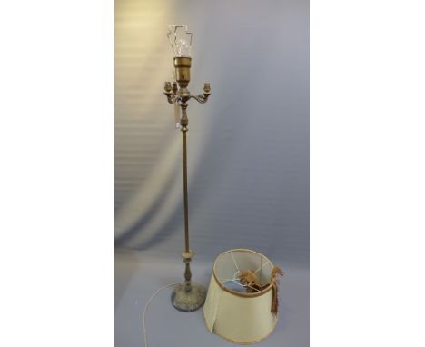 An 18th Century style brass standard lamp with marble base