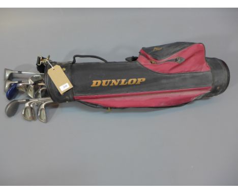 A set of Dunlop golf clubs in carry case