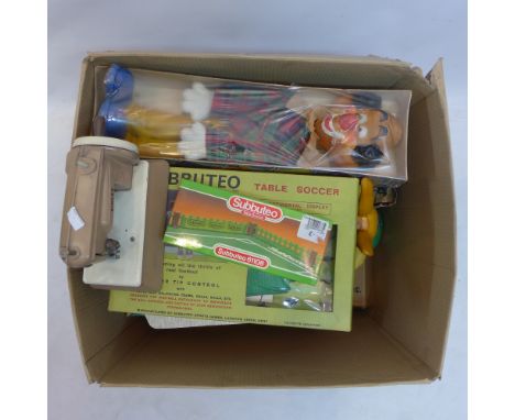 A quantity of vintage toys to include flippo, Hurricane Keil Kraft, Marx De-Luxe typewriter, Subbuteo and others 