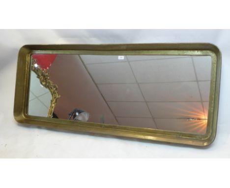 A contemporary bronze framed mirror. 140cm X 61cm