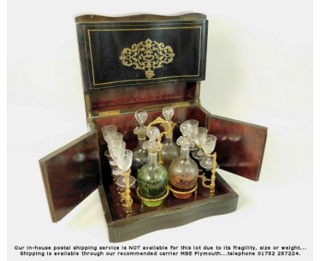 DECANTER BOX.A late 19thc French boule decanter box, with brass lift-out tray, four decanters & seven (of sixteen) glasses. 3