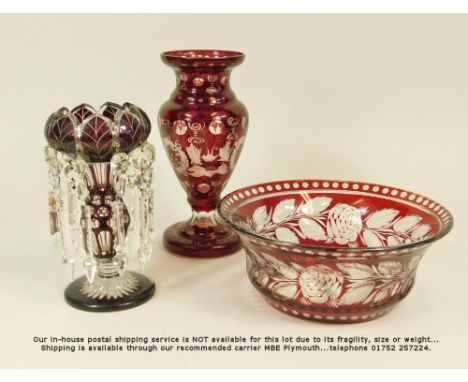 RUBY GLASS. A single cased ruby glass lustre, height 20cm. Also, a ruby glass vase with etched decoration, 25cm &amp; a flash