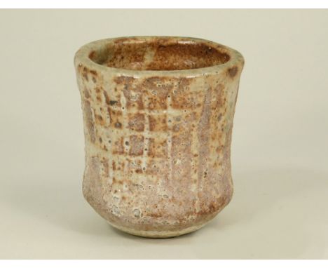 JANET LEACH. A yunomi by Janet Leach. Height 9cm. Leach Pottery &amp; personal marks. Firing faults &amp; damage.