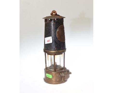 A miner's lamp, type SL, no. 208 marked Eccles, 