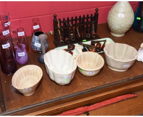 A set of four 19th century ceramic jelly moulds