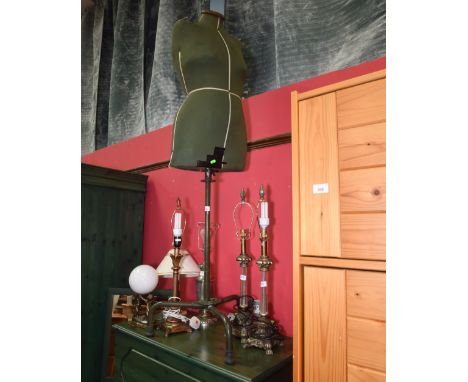A vintage half mannequin on stand