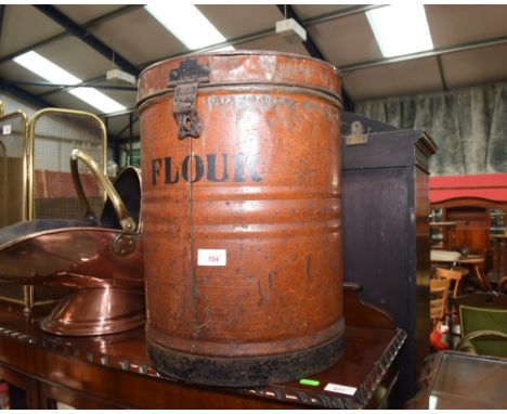 A vintage tin flour bin