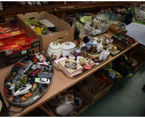 Four trays inc. vintage lighters, perfumes, play worn vehicles etc