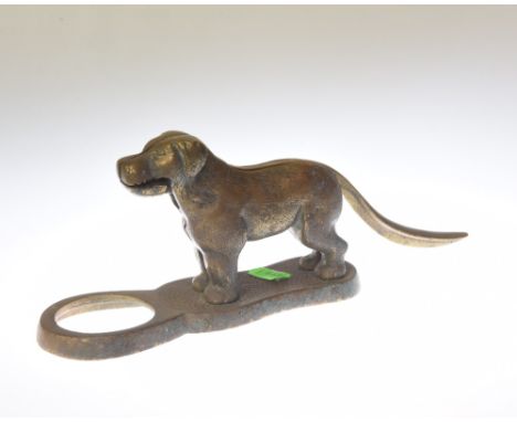 A brass nut cracker in the form of a dog
