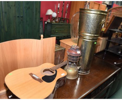 An oil lamp, brass jardiniere and an acoustic guitar