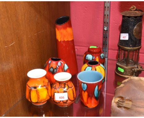 A group of Poole Pottery vases, ginger jar and a beaker (7)