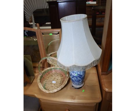 A wicker basket; tog. with a table lamp