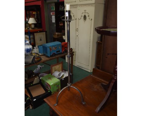A tripod candle stand