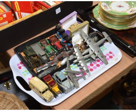 A tray inc. Dinky, Britains, Meccano and other playworn vehicles, gilt cufflinks, vintage Robertsons Golly models etc.