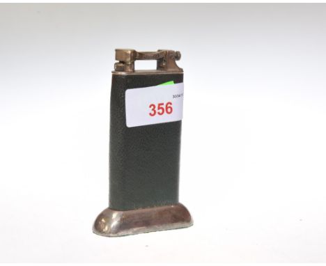 A Dunhill Vintage table lighter bound in green leather, 