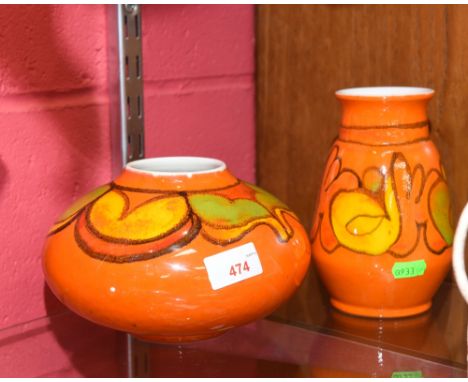 Two Poole Pottery vases decorated with orange glaze 
