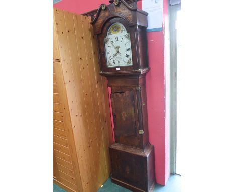 An 18th century inlaid mahogany longcase clock, the white dial with Roman numerals and date aperture and with floral painted 