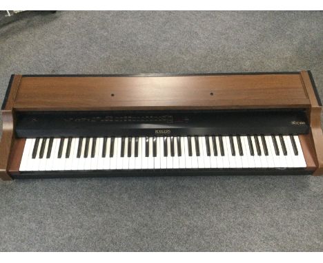 A vintage Rodgers C-100 keyboard with pedals, stool, manual etc.