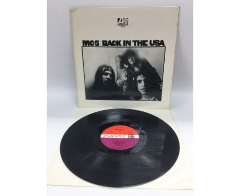 A first UK pressing of 'Back In The USA' by MC5, vinyl Ex.