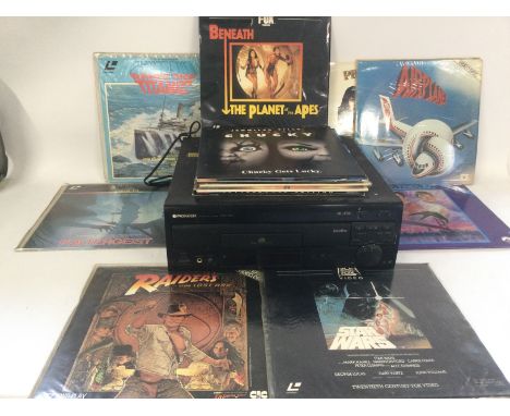A Pioneer CLD-2950 Laser disc player plus a selection of Laser discs including the first Star Wars movie, Raiders Of The Lost
