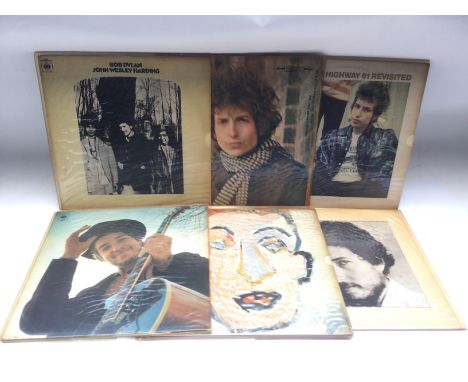 Six Bob Dylan LPs comprising 'Highway 61 Revisited', 'Blonde On Blonde', 'Nashville Skyline' and others.