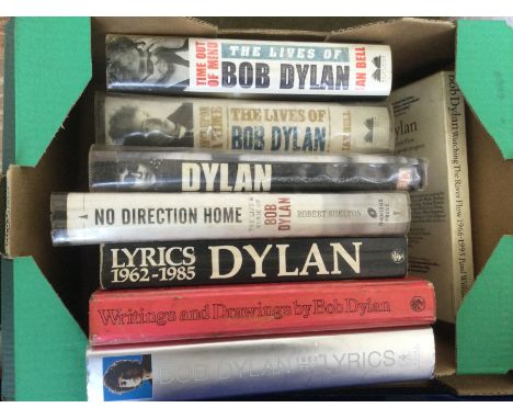 Seven boxes of Bob Dylan books.