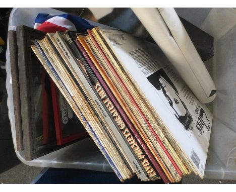 A box of Elvis Presley LPs, posters, mirrors etc.